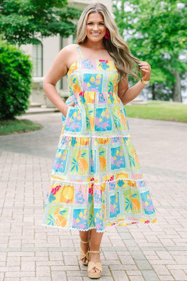 Plus Size tiered midi dress with a colorful fruit print, square neckline, and white ric-rac trim.