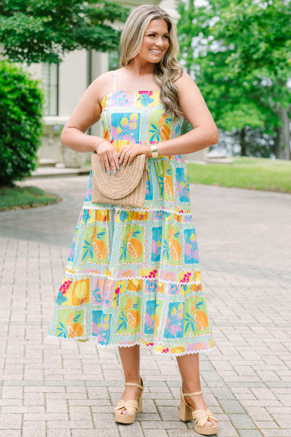 Plus Size tiered midi dress with a colorful fruit print, square neckline, and white ric-rac trim.