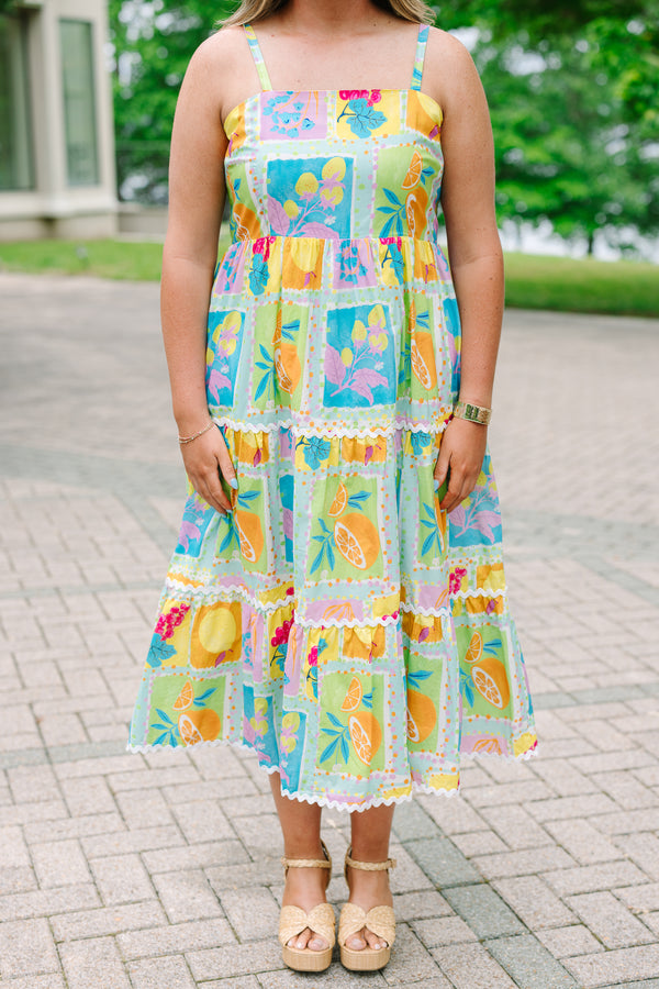 Plus Size tiered midi dress with a colorful fruit print, square neckline, and white ric-rac trim.