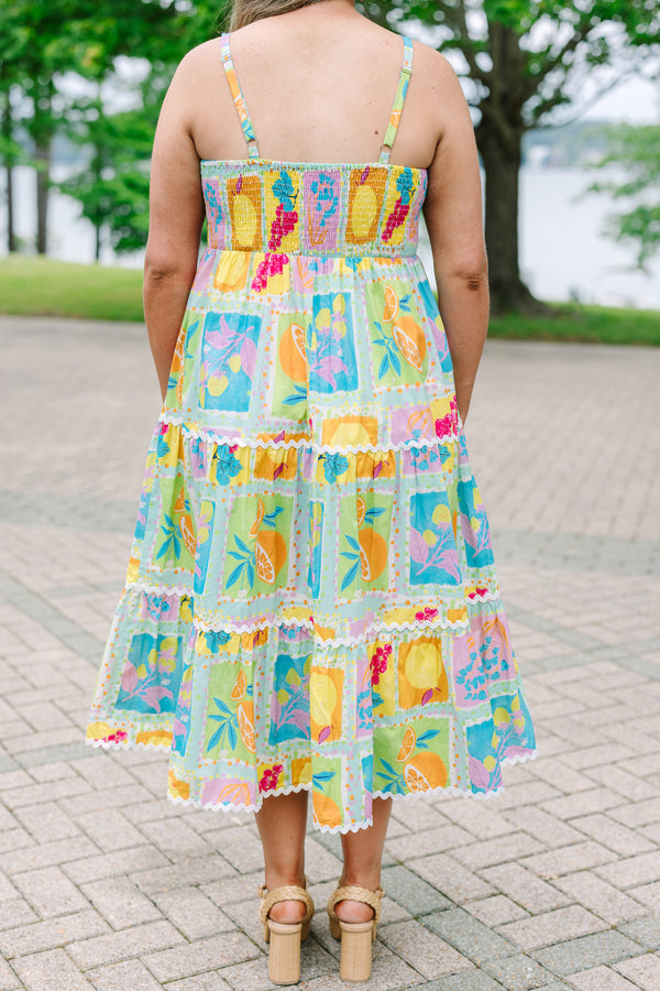 Plus Size tiered midi dress with a colorful fruit print, square neckline, and white ric-rac trim.