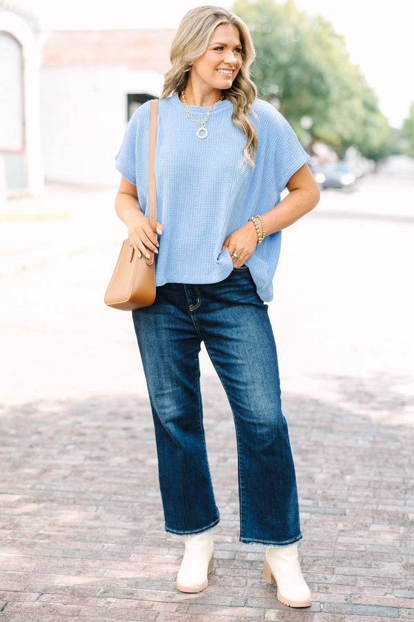 Plus Size cornflower blue ribbed knit short sleeve top with a round neckline and relaxed fit.