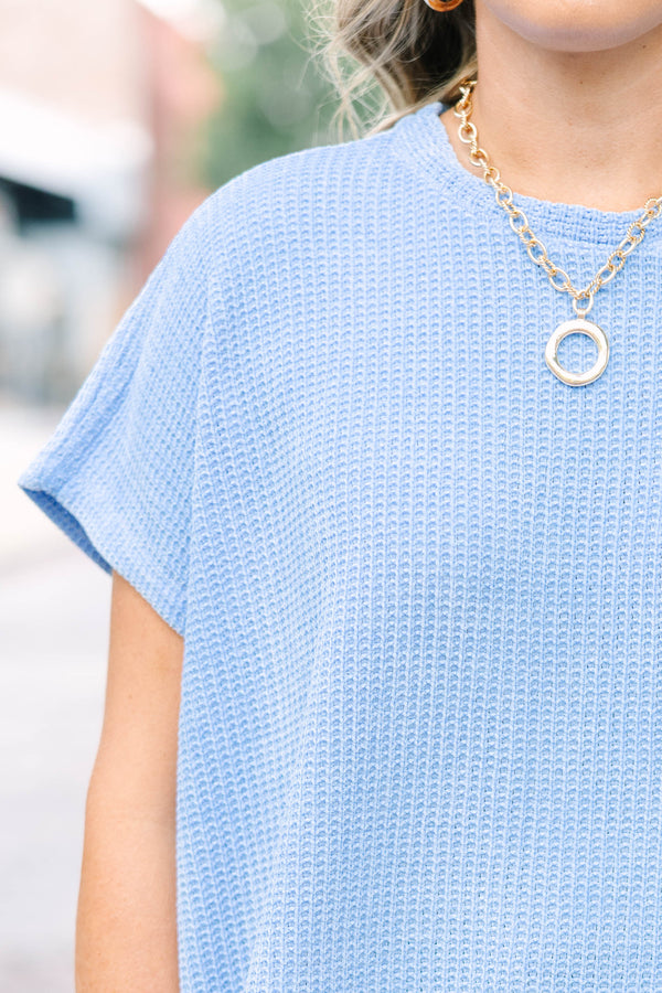 Plus Size cornflower blue ribbed knit short sleeve top with a round neckline and relaxed fit.