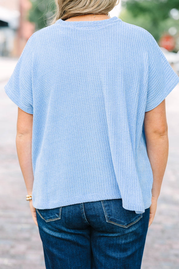 Plus Size cornflower blue ribbed knit short sleeve top with a round neckline and relaxed fit.