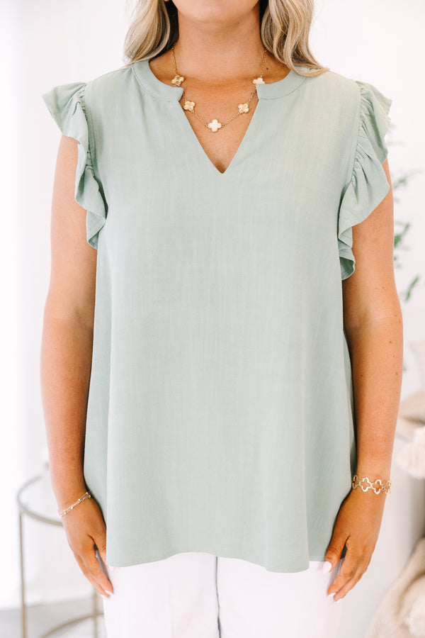 Chic Soul plus size clothing, Light green top with a v-neckline and flutter sleeves