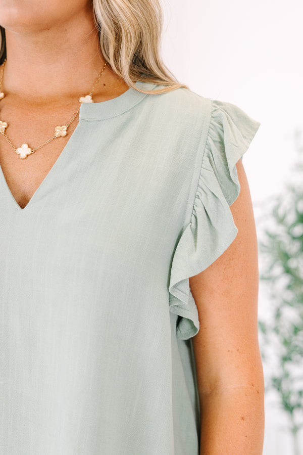 Chic Soul plus size clothing, Light green top with a v-neckline and flutter sleeves