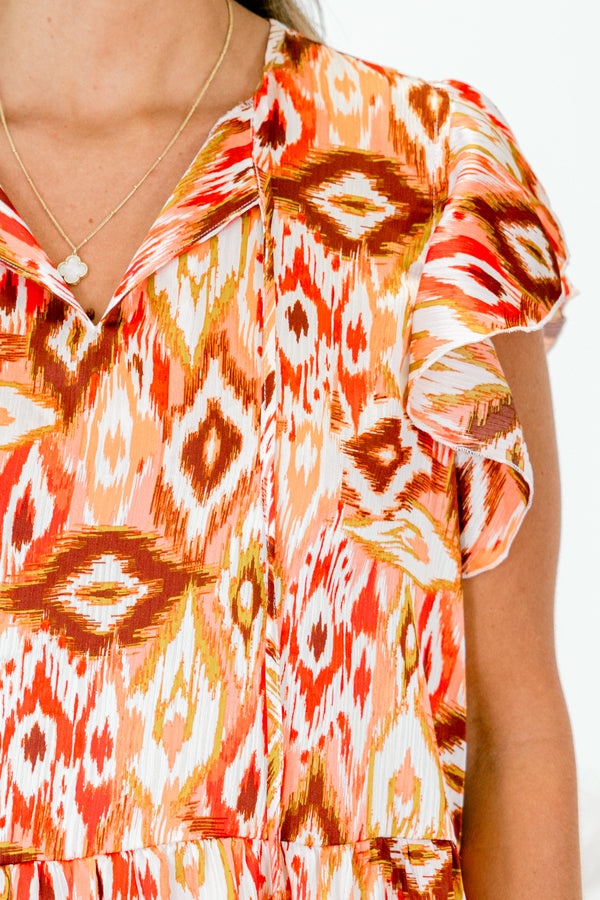 Chic Soul plus size clothing, sleeveless white and orange baby doll top with Aztec pattern