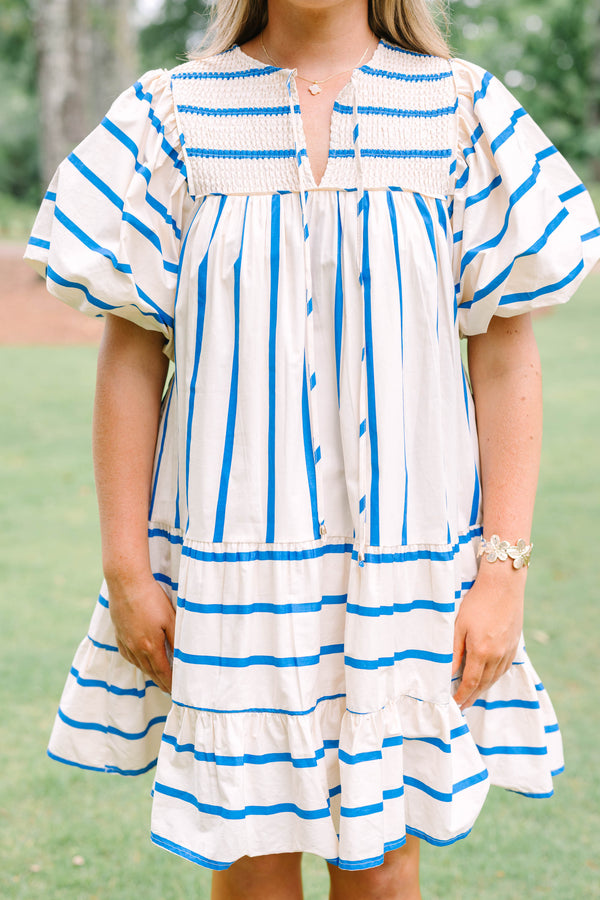 Plus Size blue and white striped cotton dress with smocked split neck and puff sleeves.