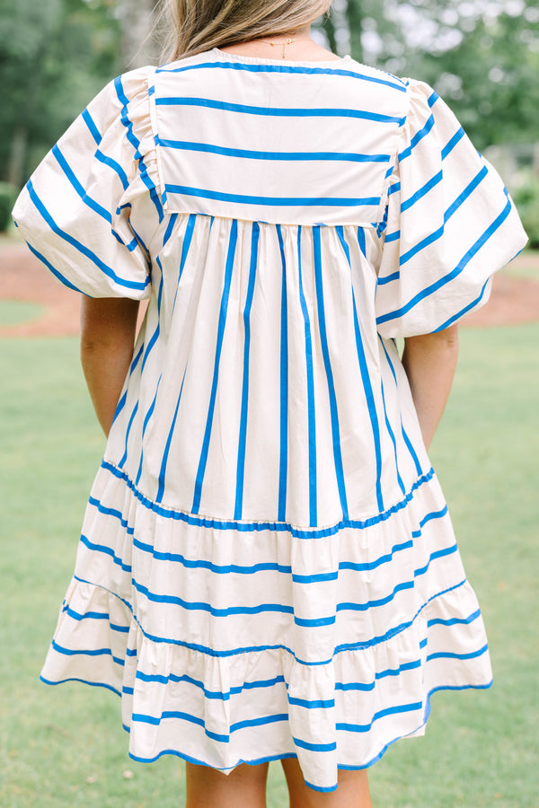 Plus Size blue and white striped cotton dress with smocked split neck and puff sleeves.
