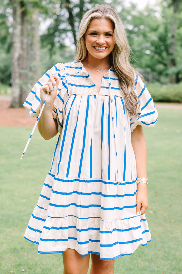 Plus Size blue and white striped cotton dress with smocked split neck and puff sleeves.
