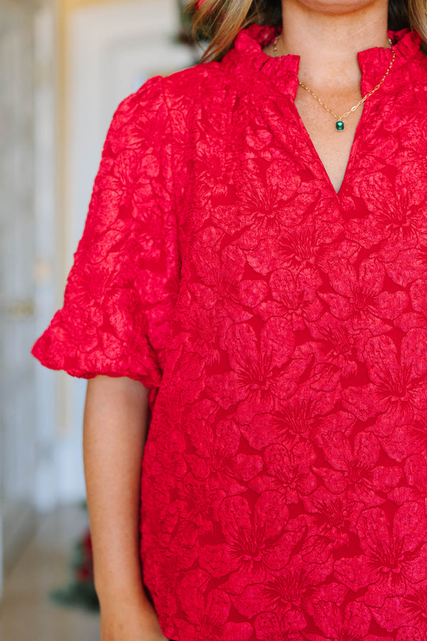 Red floral jacquard plus size top with ruffle neck, short puff sleeves and flowy fit.