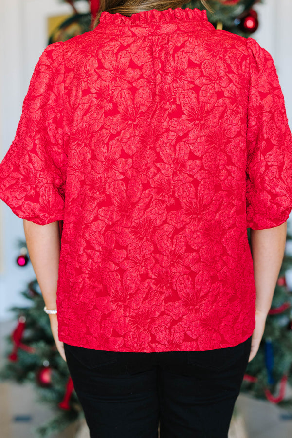Red floral jacquard plus size top with ruffle neck, short puff sleeves and flowy fit.
