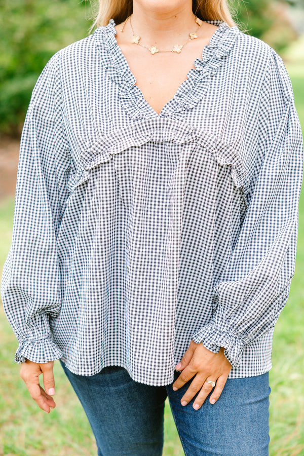 Chic Soul plus size clothing, black and white gingham long sleeve flowy top with ruffle puff sleeves and ruffle detailing around the chest