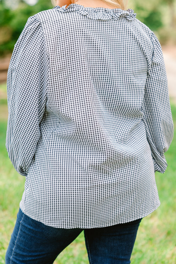 Chic Soul plus size clothing, black and white gingham long sleeve flowy top with ruffle puff sleeves and ruffle detailing around the chest