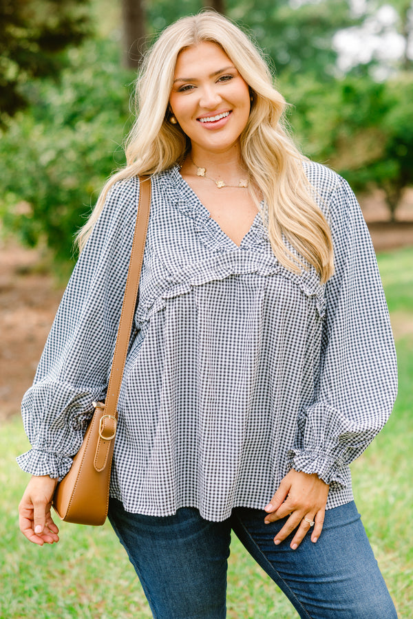 Chic Soul plus size clothing, black and white gingham long sleeve flowy top with ruffle puff sleeves and ruffle detailing around the chest