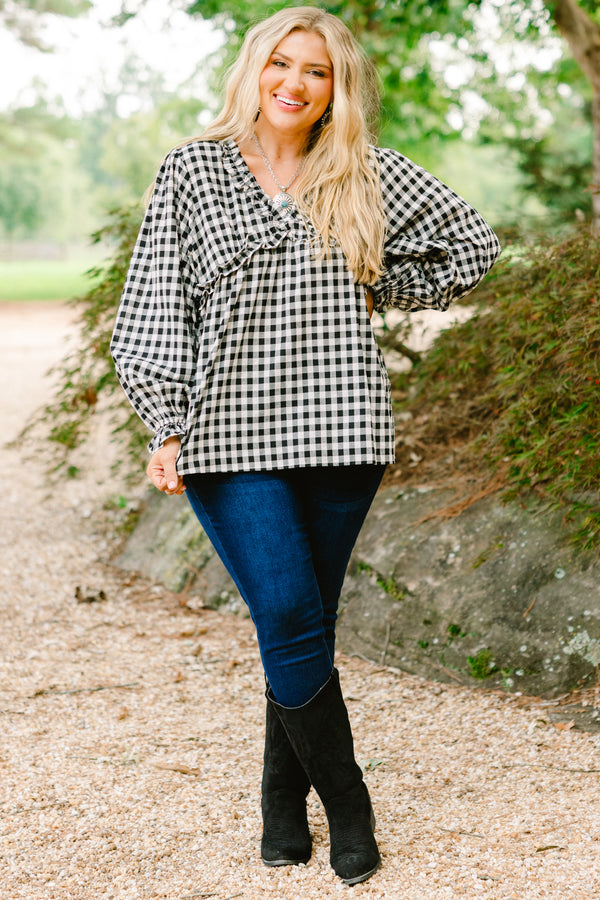 Chic Soul plus size clothing, black gingham long sleeve top with ruffle details at the end of the sleeves and along the chest area and v-neckline 