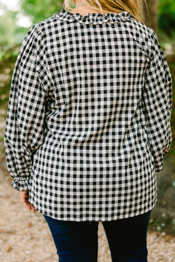 Chic Soul plus size clothing, black gingham long sleeve top with ruffle details at the end of the sleeves and along the chest area and v-neckline 