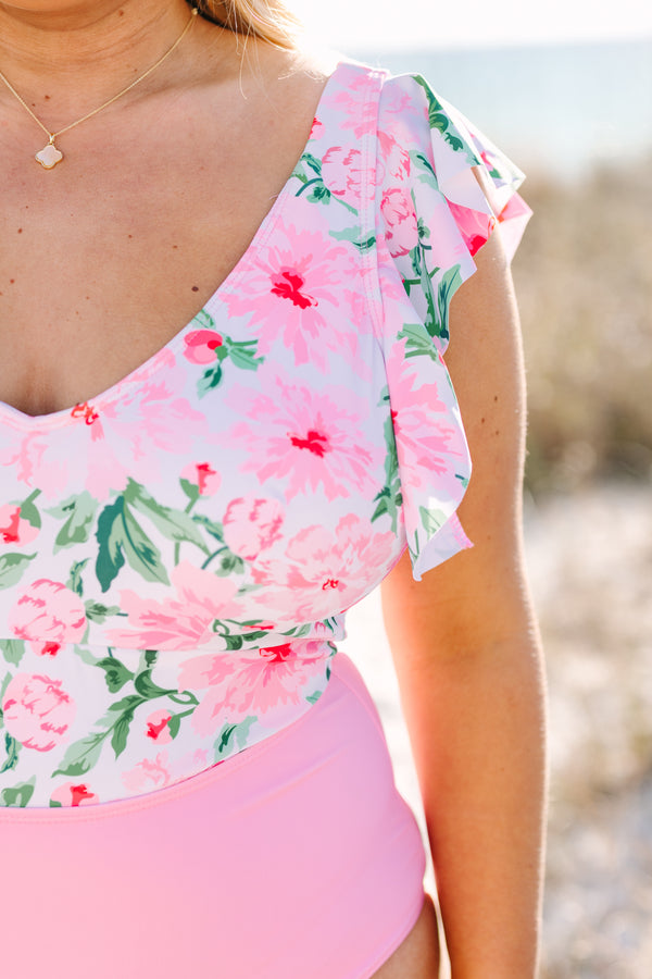 Plus size one piece swimsuit with floral and pink color block and flutter sleeves