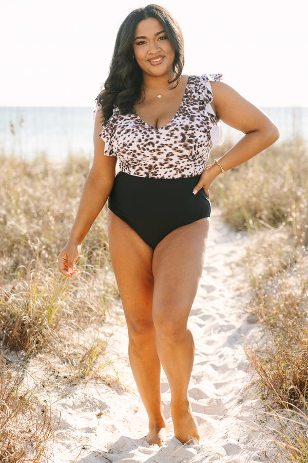 Plus Size snow leopard print colorblock swimsuit with flutter sleeves and a black bottom.