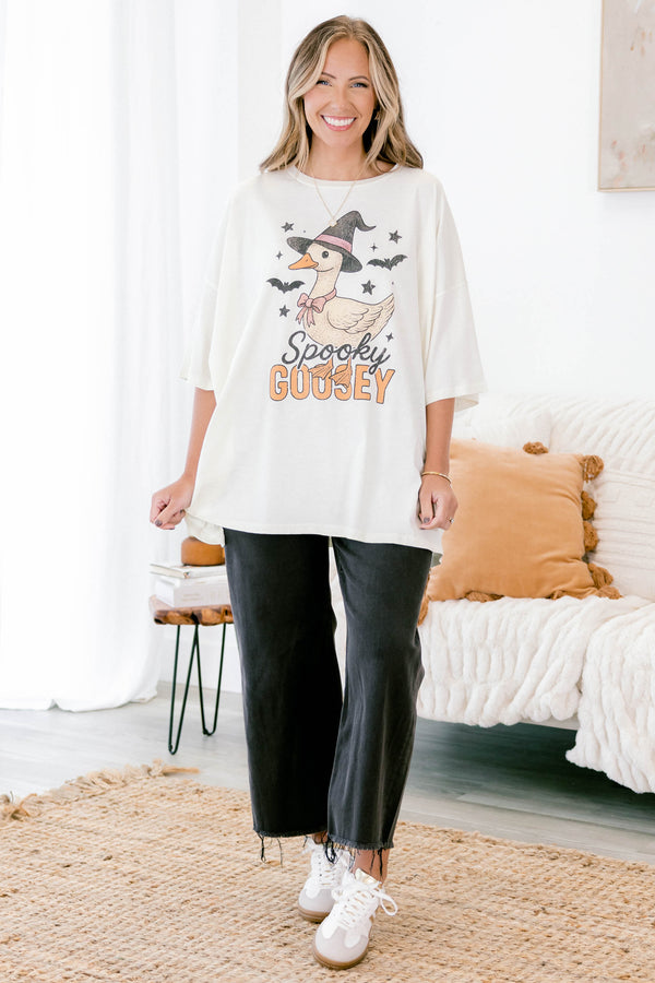 Chic Soul Plus size clothing, ivory graphic tee that has a cartoon goose with a witch hat and bats graphic in the middle of the shirt