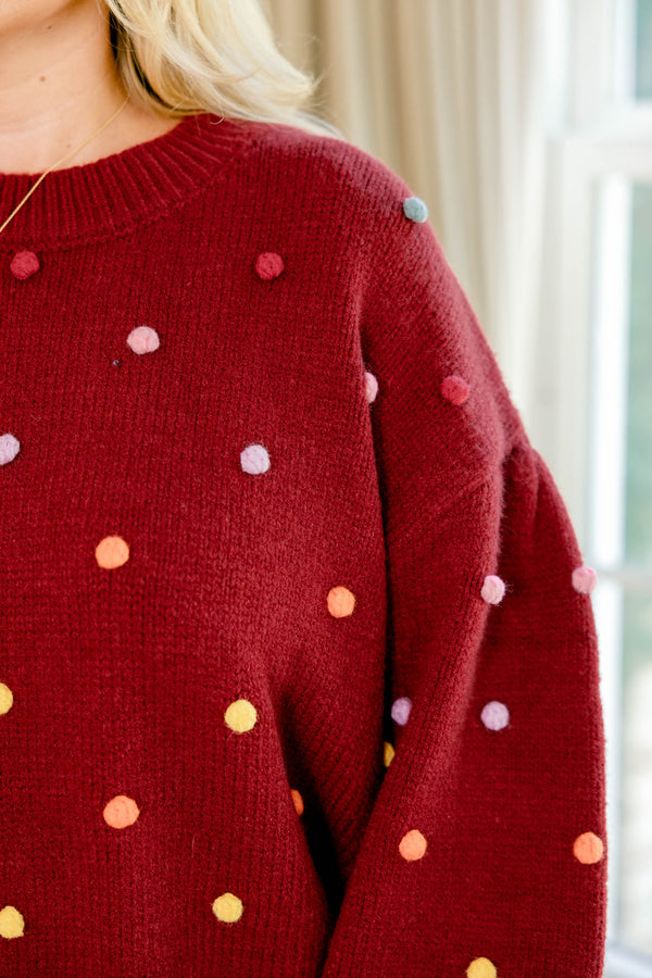 Chic Soul plus size clothing, red long sleeve oversized sweater with multi colored ball embellishments
