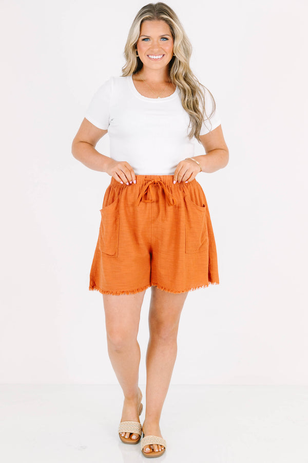 Plus Size clay-colored cotton-rayon shorts with an elastic drawstring waist and frayed hem.