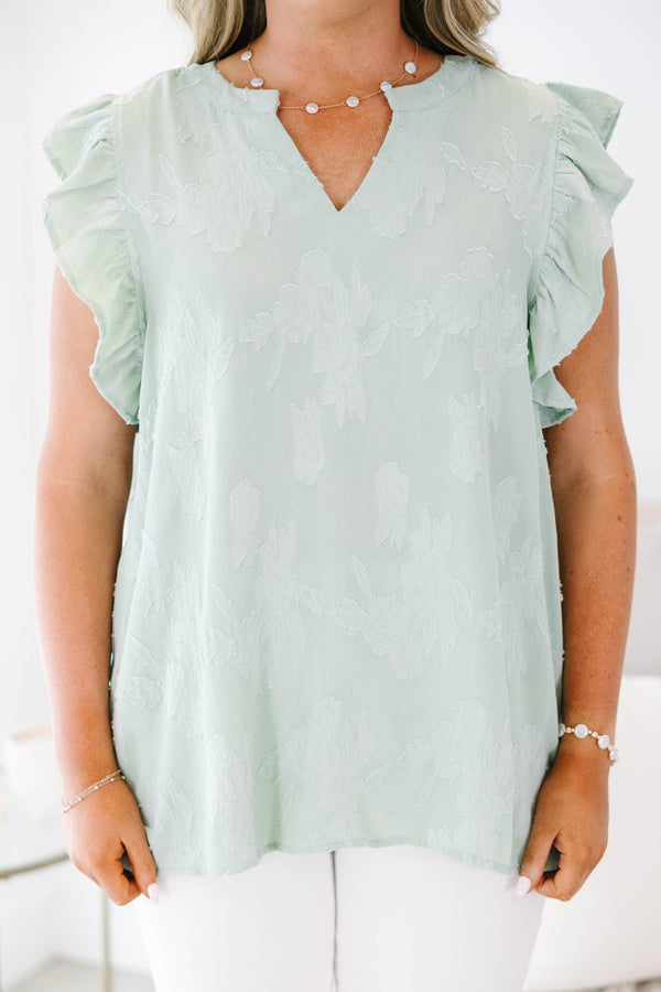 Plus size sage floral top with ruffle sleeves and a flowy fit