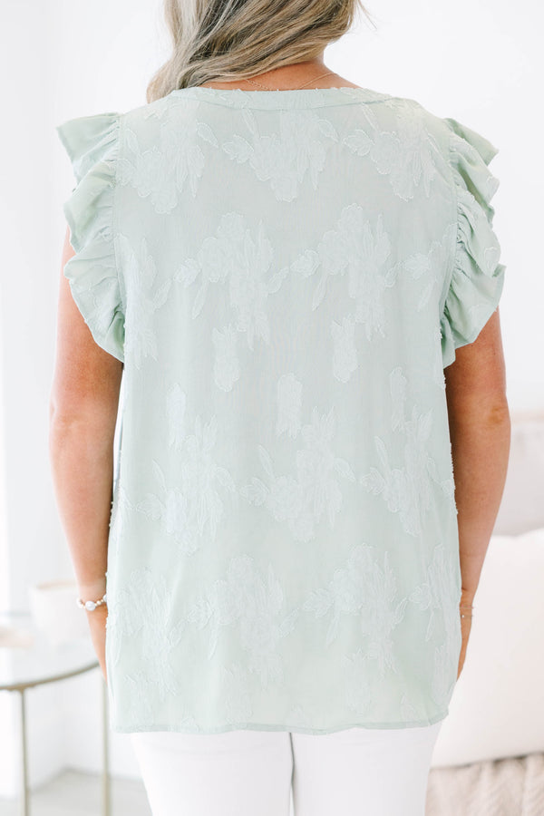 Plus size sage floral top with ruffle sleeves and a flowy fit