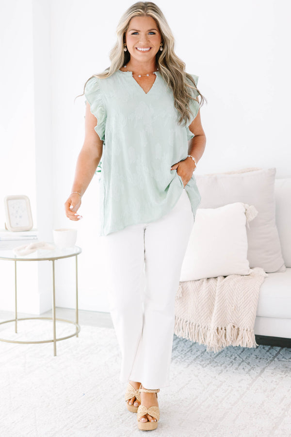 Plus size sage floral top with ruffle sleeves and a flowy fit