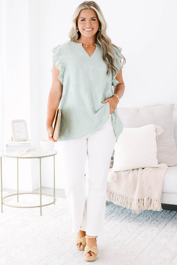 Plus size sage floral top with ruffle sleeves and a flowy fit