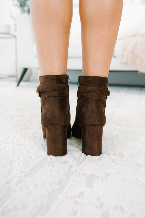 Plus Size brown microsuede ankle booties with a pointed toe and gold-tone buckle accent.