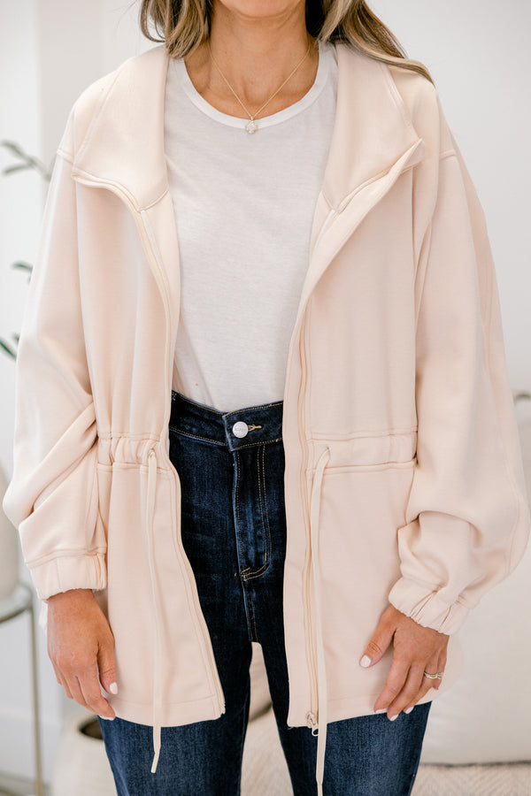 Chic Soul plus size clothing, ivory long sleeve jackets with a sinched waist and a zipper going down the middle 