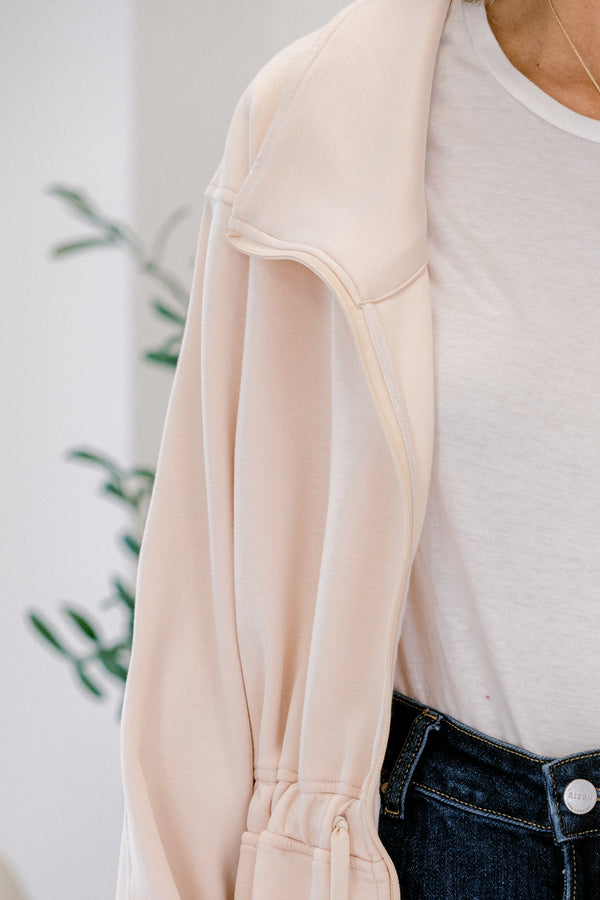 Chic Soul plus size clothing, ivory long sleeve jackets with a sinched waist and a zipper going down the middle 