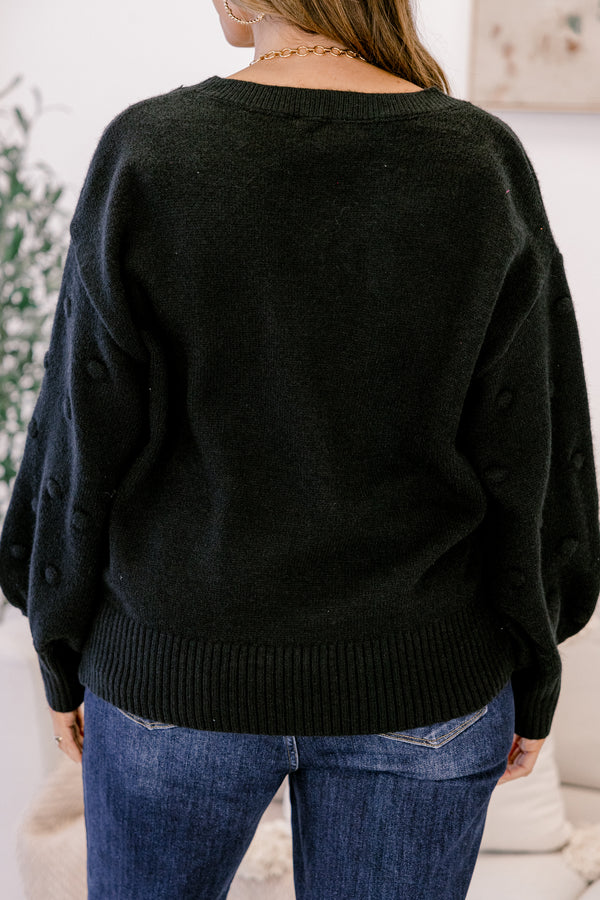 Chic Soul plus size clothing, black long sleeve sweater with raised dots making the shape of a heart on the front
