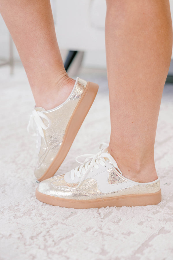 Chic Soul plus size clothing, gold sneakers with a taupe platform and a white stripe detail on one side of each sneaker 