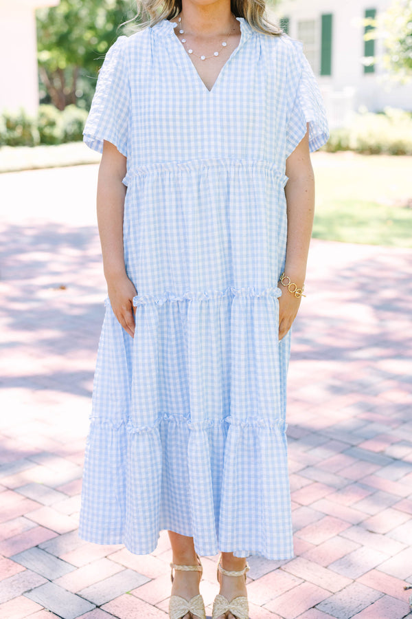 Plus Size baby blue gingham maxi dress with a V-neckline, short flutter sleeves, and tiered skirt.