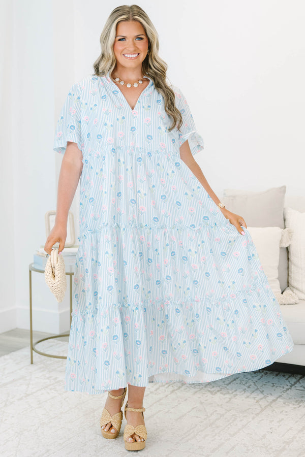 Plus Size baby blue striped tiered dress with a split v-neck and floral pattern.