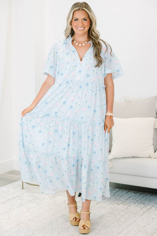 Plus Size baby blue striped tiered dress with a split v-neck and floral pattern.