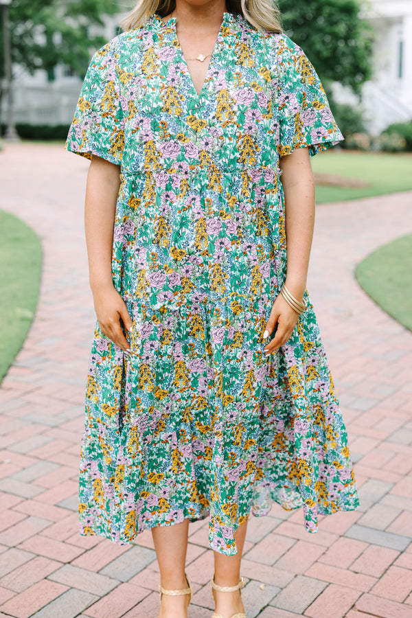 Plus Size cream floral tiered maxi dress with short flutter sleeves and a V-neckline.