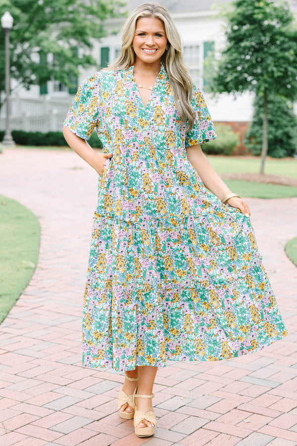 Plus Size cream floral tiered maxi dress with short flutter sleeves and a V-neckline.