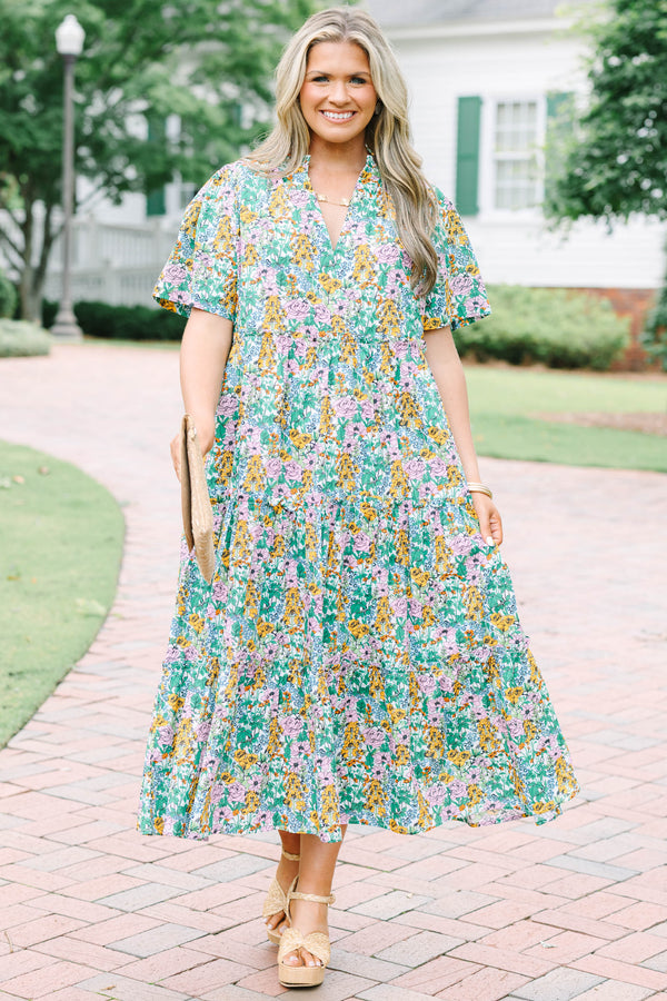 Plus Size cream floral tiered maxi dress with short flutter sleeves and a V-neckline.
