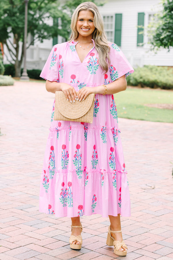Plus Size fuchsia floral tiered midi dress with a V-neckline and short flutter sleeves.