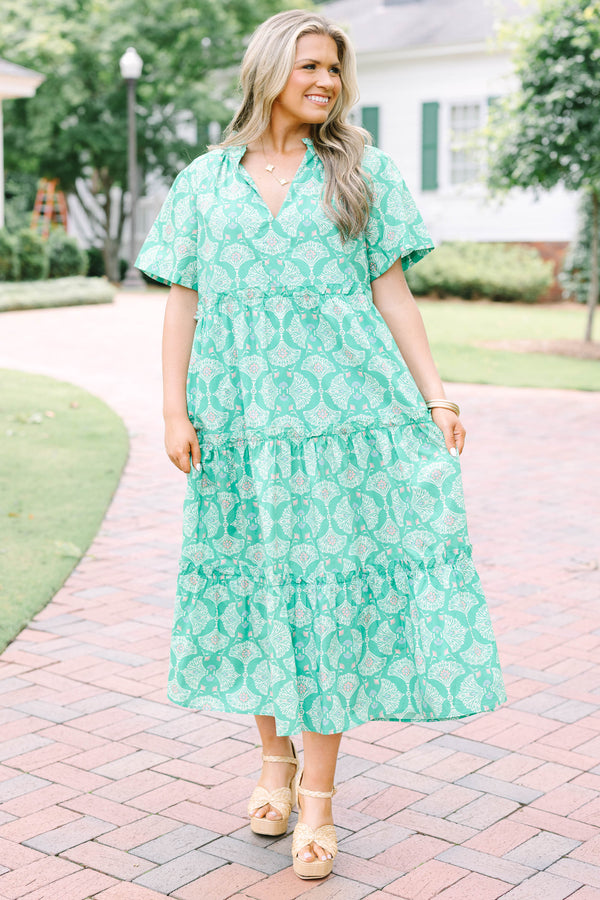 Plus Size Kelly Green tiered midi dress with a white floral pattern, V-neckline, and short sleeves.