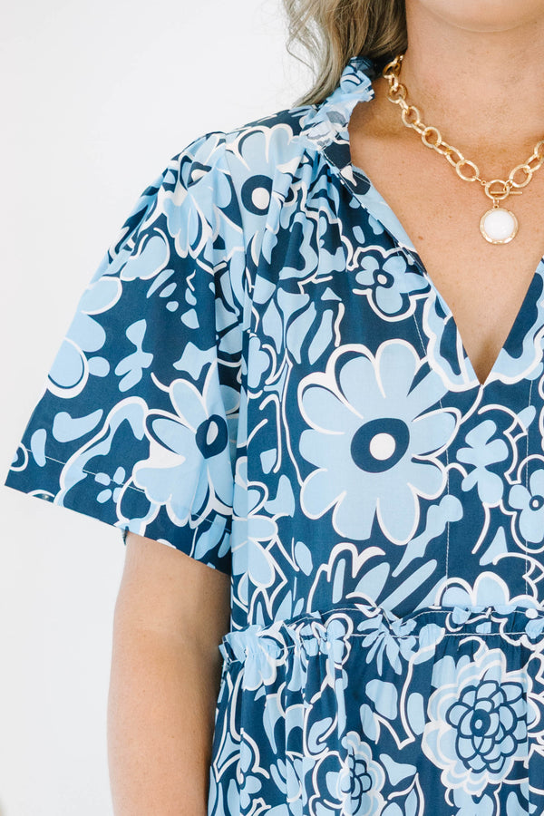 Plus size Oxford Blue Floral Straight Shot Dress with a flowy tiered skirt and ruffle sleeves.