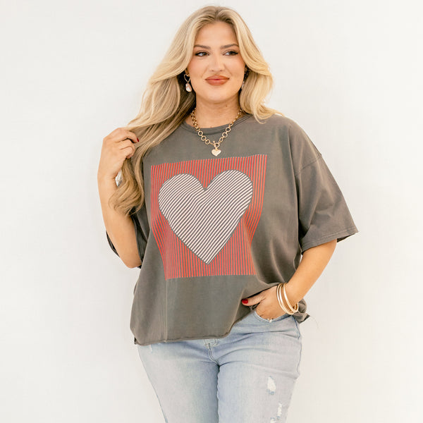 Chic Soul plus size clothing, charcoal gray short sleeve vintage wash slightly cropped tee with red square and white and black heart inside of it on the front of the tee