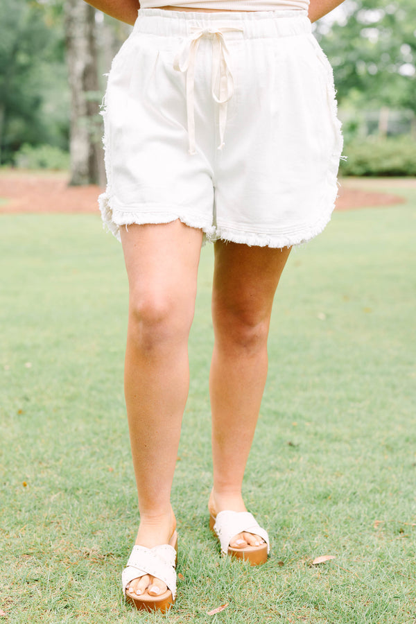 Plus Size ivory drawstring shorts with a frayed hem and elastic waistband.