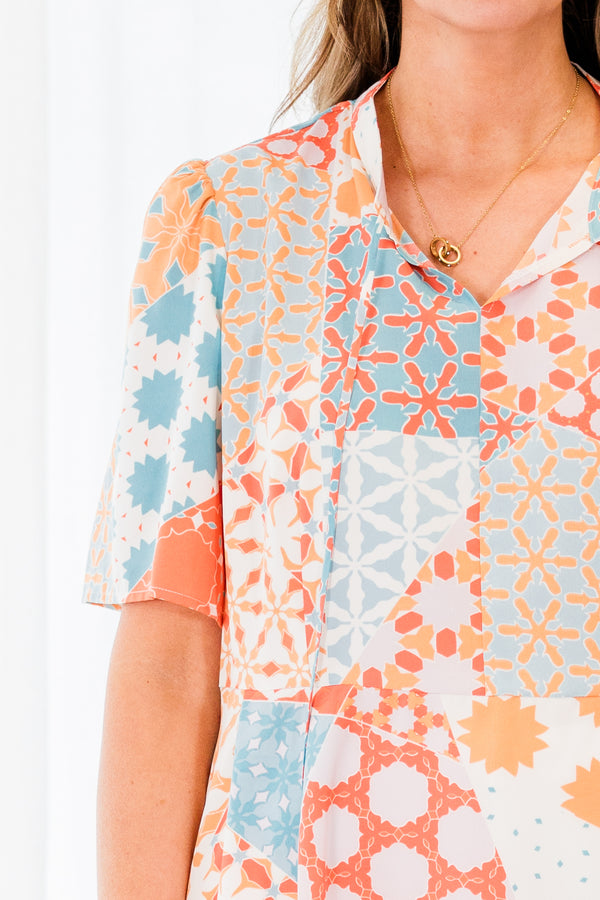Chic Soul plus size clothing, orange short sleeve geometric multi pattern top with v neckline with tie detail