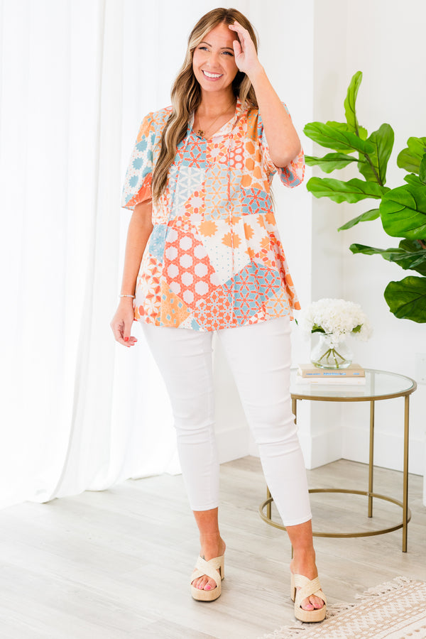 Chic Soul plus size clothing, orange short sleeve geometric multi pattern top with v neckline with tie detail