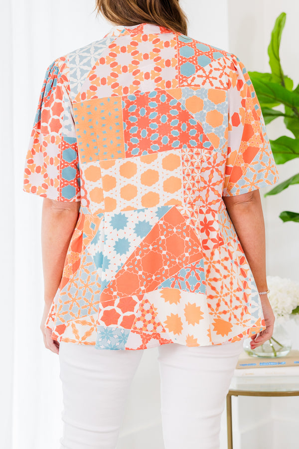 Chic Soul plus size clothing, orange short sleeve geometric multi pattern top with v neckline with tie detail