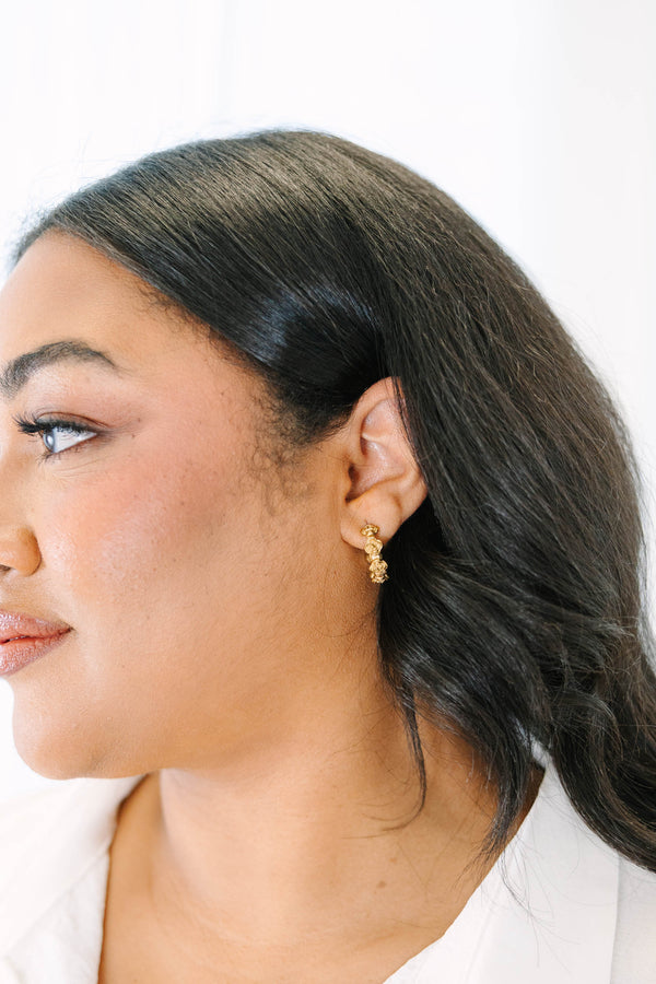 Gold textured hoops with post backs