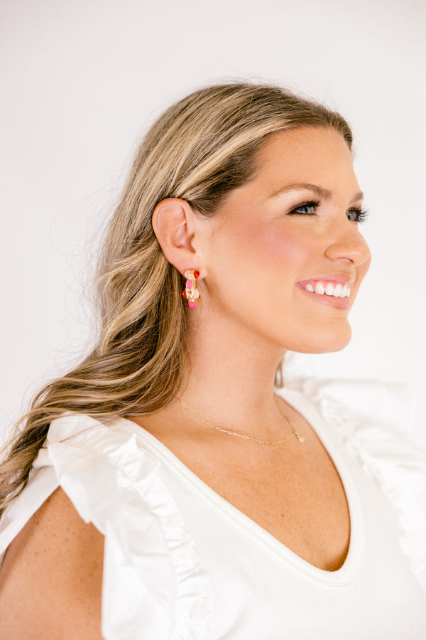 Chic Soul plus size clothing, small gold hoop earrings with pink, coral, and light pink jewels along the front of the hoop earring